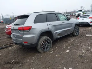 2021 Jeep Grand Cherokee Trailhawk with VIN 1C4RJFLG2MC579884, listed as a IAAI auction lot 41526769 with 115,461 mi miles. Bid and sale history available at carsss.com. Image 4.