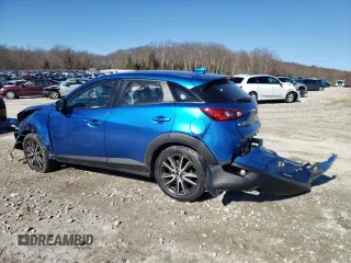 2017 Mazda CX-3 Touring with VIN JM1DKFC71H0149617, listed as a Copart auction lot 43625215 with 71,828 mi miles and Salvage Title. Bid and sale history available at DreamBid. Image 2.