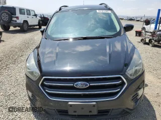 2017 Ford Escape SE z VIN 1FMCU0G92HUD20328, wystawiony jako Copart lot #55181485 z przebiegiem Nie podano mil oraz Szkoda całkowita • Salvage title. Historia ofert i sprzedaży dostępna na DreamBid. Obrazek 5.