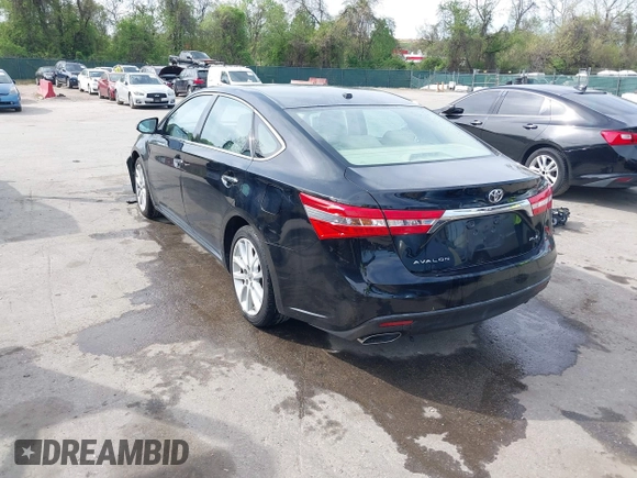 2014 Toyota Avalon Limited with VIN 4T1BK1EB5EU129821, listed as a IAAI auction lot 42085414 with 113,729 mi miles. Bid and sale history available at carsss.com. Image 3.