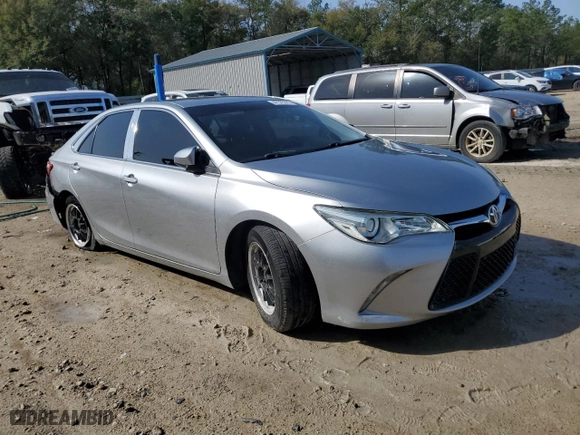 2015 Toyota Camry XLE with VIN 4T1BF1FK1FU989879, listed as a Copart auction lot 47575515 with 116,096 mi miles and Salvage Title. Bid and sale history available at carsss.com. Image 4.