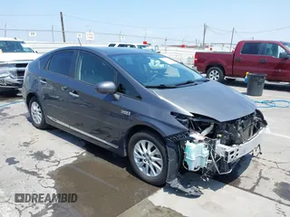 2014 Toyota Prius with VIN JTDKN3DP1E3051449, listed as a IAAI auction lot 42588323 with 211,092 mi miles and . Bid and sale history available at DreamBid. Image 1.