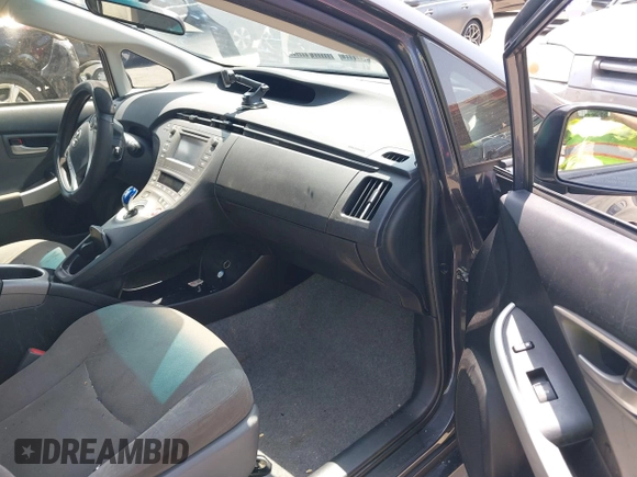 2015 Toyota Prius Four with VIN JTDKN3DU9F0473025, listed as a IAAI auction lot 42425733 with 124,196 mi miles and . Bid and sale history available at DreamBid. Image 5.