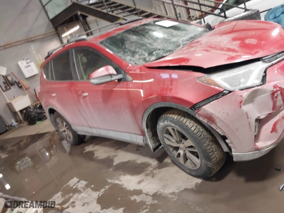 2017 Toyota RAV4 XLE with VIN JTMRFREV2HJ168971, listed as a IAAI auction lot 41504462 with 114,259 mi miles. Bid and sale history available at carsss.com. Image 13.
