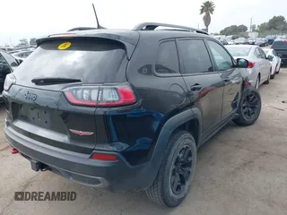2019 Jeep Cherokee Trailhawk with VIN 1C4PJMBX6KD232515, listed as a IAAI auction lot 39495367 with 53,293 mi miles and . Bid and sale history available at DreamBid. Image 4.