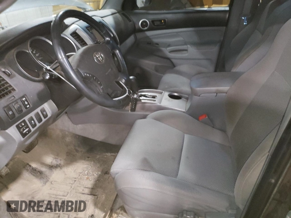 2009 Toyota Tacoma z VIN 3TMLU42N79M027000, wystawiony jako Copart lot #58371365 z przebiegiem 168 989 mil mil oraz Szkoda całkowita • Salvage title. Historia ofert i sprzedaży dostępna na DreamBid. Obrazek 7.