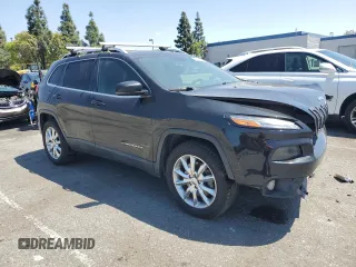 2016 Jeep Cherokee Limited with VIN 1C4PJMDB5GW231904, listed as a Copart auction lot 56252665 with 195,190 mi miles and Clean Title. Bid and sale history available at DreamBid. Image 4.