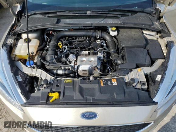 2018 Ford Focus SE z VIN 1FADP3FE8JL331853, wystawiony jako Copart lot #74013984 z przebiegiem 73 237 mil mil oraz Szkoda całkowita • Salvage title. Historia ofert i sprzedaży dostępna na DreamBid. Obrazek 12.