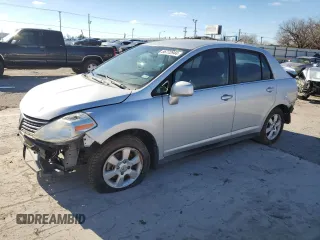 2009 Nissan Versa 1.8 S with VIN 3N1BC11E29L372166, listed as a Copart auction lot 86772944 with 0 mi miles and Salvage Title. Bid and sale history available at carsss.com. Image 1.