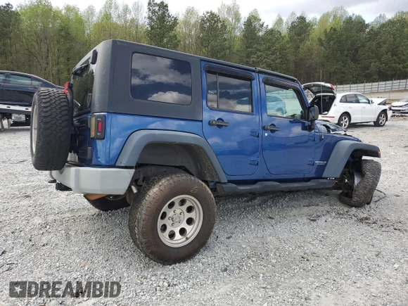 2009 Jeep Wrangler Unlimited Rubicon with VIN 1J4GA69169L762992, listed as a Copart auction lot 51674355 with 147,181 mi miles and Salvage title. Bid and sale history available at DreamBid. Image 3.