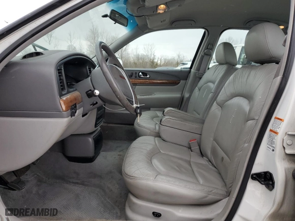 1999 Lincoln Continental with VIN 1LNHM97VXXY608466, listed as a Copart auction lot 45400935 with 155,333 mi miles and Salvage Title. Bid and sale history available at carsss.com. Image 7.