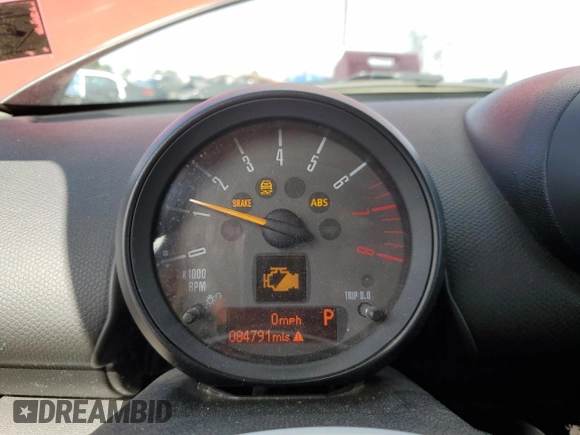 2015 MINI Countryman with VIN WMWZB3C58FWR44187, listed as a Copart auction lot 48236575 with 84,791 mi miles and Salvage Title. Bid and sale history available at DreamBid. Image 9.