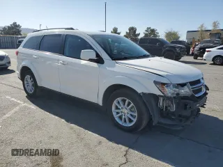 2017 Dodge Journey SXT with VIN 3C4PDCBG7HT531547, listed as a Copart auction lot 52322685 with 121,876 mi miles and Salvage title. Bid and sale history available at DreamBid. Image 4.