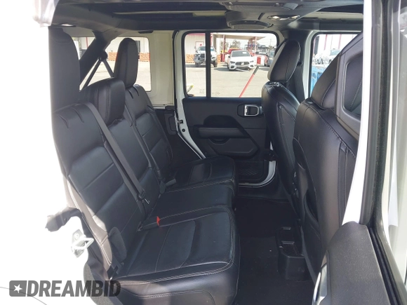 2019 Jeep Wrangler Unlimited Sahara with VIN 1C4HJXENXKW684942, listed as a IAAI auction lot 42021869 with 55,137 mi miles and . Bid and sale history available at DreamBid. Image 8.