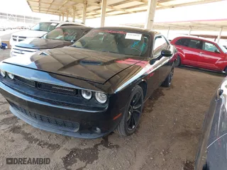 2016 Dodge Challenger SXT with VIN 2C3CDZAG0GH137483, listed as a IAAI auction lot 41970836 with 111,148 mi miles. Bid and sale history available at carsss.com. Image 2.