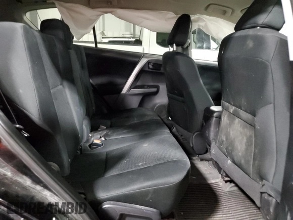 2018 Toyota RAV4 LE with VIN 2T3BFREV6JW763007, listed as a Copart auction lot 58604545 with 107,683 mi miles and Salvage title. Bid and sale history available at DreamBid. Image 11.