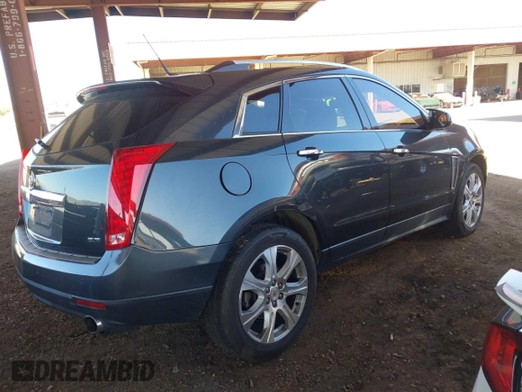 2014 Cadillac SRX Premium Collection z VIN 3GYFNDE31ES653114, wystawiony jako IAAI lot #42107858 z przebiegiem 125 192 mil mil oraz . Historia ofert i sprzedaży dostępna na DreamBid. Obrazek 4.