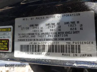 2009 Mazda Mazda3 s Touring with VIN JM1BK343091203101, listed as a IAAI auction lot 42036616 with 140,755 mi miles. Bid and sale history available at carsss.com. Image 9.