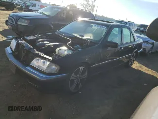 2000 Mercedes-Benz C 230/260/280/320 with VIN WDBHA29G0YA860383, listed as a Copart auction lot 87109294 with 135,777 mi miles and Salvage Title. Bid and sale history available at carsss.com. Image 1.