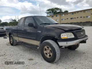 2000 Ford F-150 XL with VIN 1FTZX1721YNC09536, listed as a Copart auction lot 52645405 with 120,638 mi miles and Salvage Title. Bid and sale history available at carsss.com. Image 4.