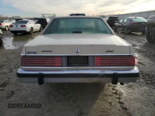 1987 Mercury Grand Marquis GS z VIN 2MEBM74F9HX714211, wystawiony jako Copart lot #43594205 z przebiegiem 26 933 mil mil oraz Szkody całkowita. Historia ofert i sprzedaży dostępna na DreamBid. Obrazek 6.