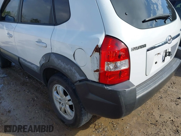 2007 Hyundai Tucson SE with VIN KM8JN12D77U638627, listed as a IAAI auction lot 41551224 with 156,125 mi miles. Bid and sale history available at carsss.com. Image 6.