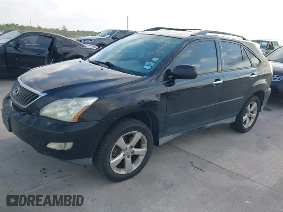 2008 Lexus RX with VIN 2T2HK31U38C064322, listed as a IAAI auction lot 42074366 with 241,459 mi miles. Bid and sale history available at carsss.com. Image 2.
