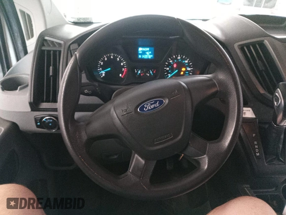 2016 Ford Transit Cargo z VIN 1FTYE1YM8GKB19172, wystawiony jako IAAI lot #42788511 z przebiegiem 143 978 mil mil oraz . Historia ofert i sprzedaży dostępna na DreamBid. Obrazek 18.