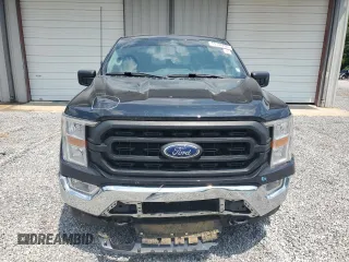 2022 Ford F-150 XL with VIN 1FTFW1E51NFA04887, listed as a Copart auction lot 55734705 with 123,590 mi miles and Salvage title. Bid and sale history available at DreamBid. Image 5.