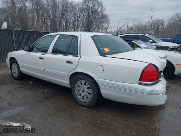 2005 Ford Crown Victoria LX with VIN 2FAFP74WX5X105415, listed as a IAAI auction lot 41523383 with 119,222 mi miles. Bid and sale history available at carsss.com. Image 14.