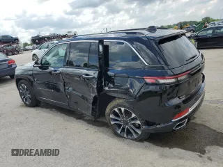 2023 Jeep Grand Cherokee Overland with VIN 1C4RJHDG0PC670537, listed as a Copart auction lot 56757285 with 24,735 mi miles and Salvage title. Bid and sale history available at DreamBid. Image 2.