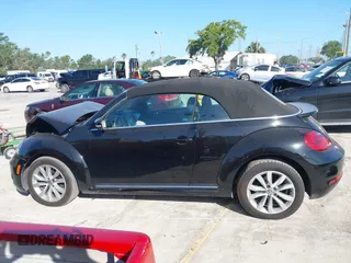 2015 Volkswagen Beetle with VIN 3VW5A7AT7FM811978, listed as a IAAI auction lot 41983986 with 84,421 mi miles and . Bid and sale history available at DreamBid. Image 14.