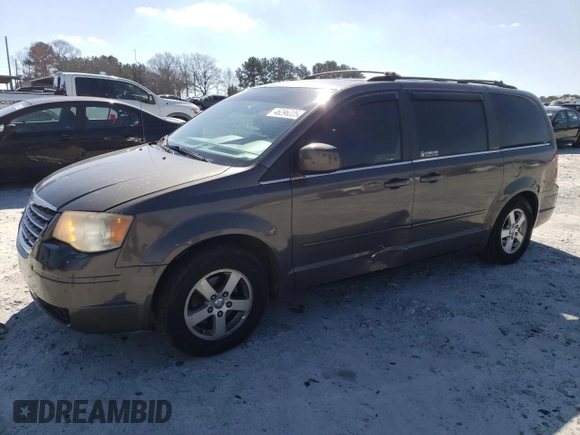 2010 Chrysler Town & Country LX with VIN 2A4RR4DE0AR309771, listed as a Copart auction lot 46296225 with 202,802 mi miles and Salvage Title. Bid and sale history available at DreamBid. Image 1.
