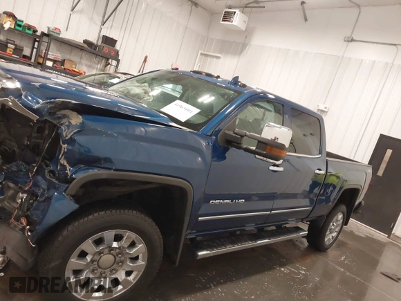 2015 GMC Sierra 2500HD Denali z VIN 1GT120E86FF655301, wystawiony jako IAAI lot #41965001 z przebiegiem 74 136 mil mil oraz . Historia ofert i sprzedaży dostępna na DreamBid. Obrazek 15.
