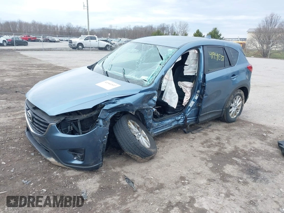 2016 Mazda CX-5 Touring with VIN JM3KE4CY8G0858045, listed as a IAAI auction lot 41941537 with 103,532 mi miles. Bid and sale history available at carsss.com. Image 2.