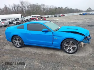 2013 Ford Mustang GT with VIN 1ZVBP8CF4D5268218, listed as a IAAI auction lot 41555868 with 219,385 mi miles. Bid and sale history available at carsss.com. Image 13.
