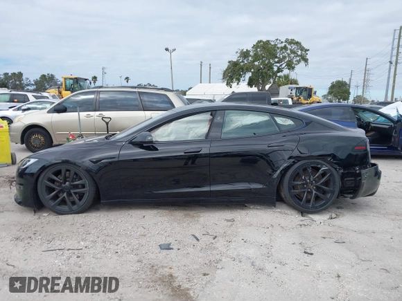 2023 Tesla Model S with VIN 5YJSA1E52PF500088, listed as a IAAI auction lot 41372918 with Not provided miles and . Bid and sale history available at DreamBid. Image 15.