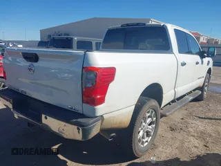 2016 Nissan Titan SL z VIN 1N6BA1F21GN504118, wystawiony jako IAAI lot #41729710 z przebiegiem 127 760 mil mil oraz . Historia ofert i sprzedaży dostępna na DreamBid. Obrazek 4.