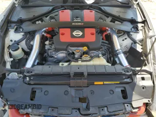2015 Nissan 370Z Nismo z VIN JN1AZ4EH3FM441254, wystawiony jako Copart lot #52646145 z przebiegiem 74 303 mil mil oraz Szkoda całkowita • Salvage title. Historia ofert i sprzedaży dostępna na DreamBid. Obrazek 11.