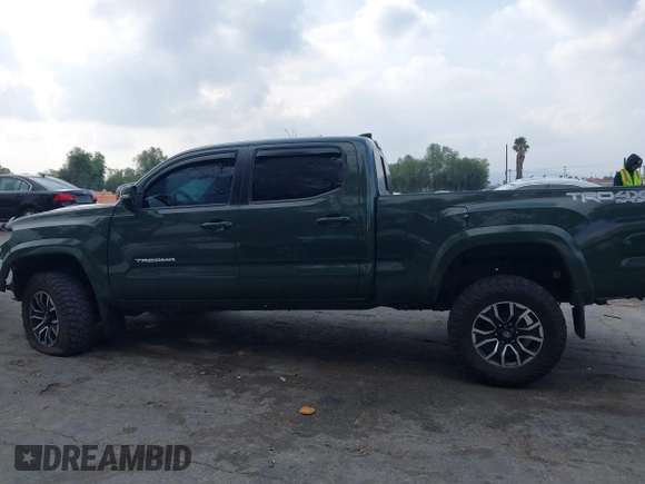 2021 Toyota Tacoma 4WD SR5 with VIN 3TMDZ5BN0MM116198, listed as a IAAI auction lot 41445815 with 59,561 mi miles. Bid and sale history available at carsss.com. Image 15.