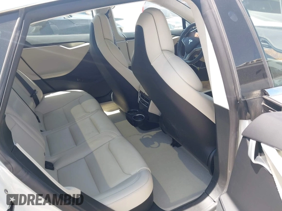 2017 Tesla Model S 100D with VIN 5YJSA1E20HF232570, listed as a IAAI auction lot 42037409 with 68,957 mi miles and . Bid and sale history available at DreamBid. Image 8.
