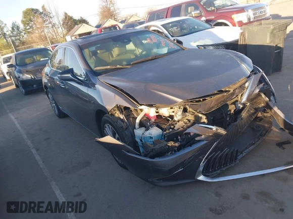 2021 Lexus ES 300h z VIN 58ADA1C1XMU001121, wystawiony jako IAAI lot #41815984 z przebiegiem 66 590 mil mil oraz . Historia ofert i sprzedaży dostępna na DreamBid. Obrazek 1.