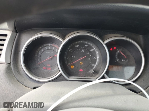 2010 Nissan Versa S with VIN 3N1BC1AP0AL409740, listed as a Copart auction lot 48996685 with 136,924 mi miles and Salvage Title. Bid and sale history available at DreamBid. Image 9.