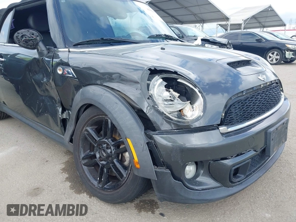 2012 MINI Convertible S with VIN WMWZP3C54CT250689, listed as a IAAI auction lot 41928624 with 126,442 mi miles and . Bid and sale history available at DreamBid. Image 13.