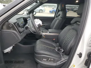 2024 Rivian R1S Adventure z VIN 7PDSGABA7RN034025, wystawiony jako Copart lot #55949335 z przebiegiem 14 429 mil mil oraz Szkody całkowita. Historia ofert i sprzedaży dostępna na DreamBid. Obrazek 7.