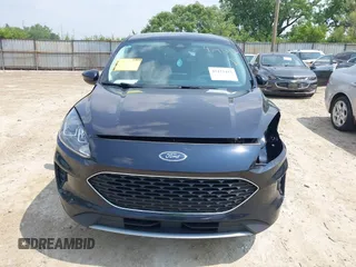 2021 Ford Escape SE with VIN 1FMCU9G65MUB03411, listed as a IAAI auction lot 42423432 with 121,755 mi miles and . Bid and sale history available at DreamBid. Image 12.