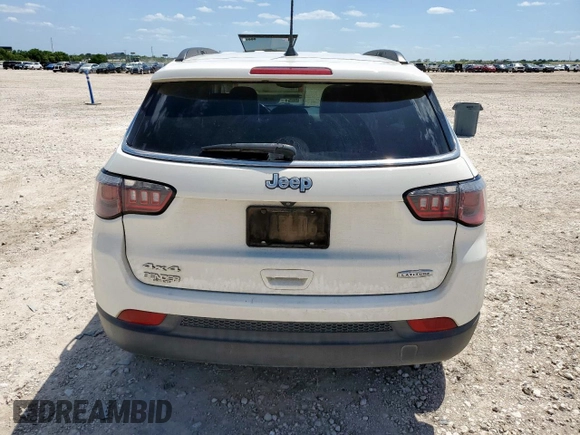 2018 Jeep Compass Altitude z VIN 3C4NJDBB0JT138862, wystawiony jako Copart lot #60074355 z przebiegiem 112 981 mil mil oraz Czysty tytuł • Clean title. Historia ofert i sprzedaży dostępna na DreamBid. Obrazek 6.