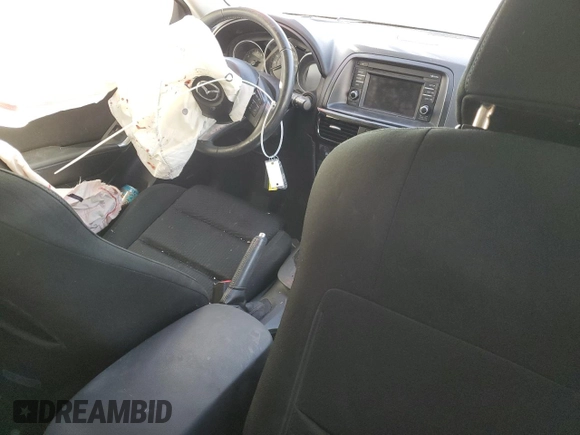 2014 Mazda CX-5 Touring with VIN JM3KE4CY1E0426409, listed as a Copart auction lot 84185294 with 0 mi miles and Salvage Title. Bid and sale history available at carsss.com. Image 7.