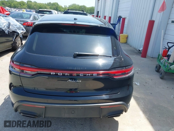 2022 Porsche Macan with VIN WP1AA2A51NLB05822, listed as a IAAI auction lot 39567077 with 54,527 mi miles. Bid and sale history available at carsss.com. Image 16.