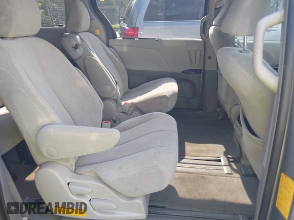 2013 Toyota Sienna LE AAS with VIN 5TDKK3DC2DS389557, listed as a IAAI auction lot 42589108 with 205,115 mi miles and . Bid and sale history available at DreamBid. Image 8.